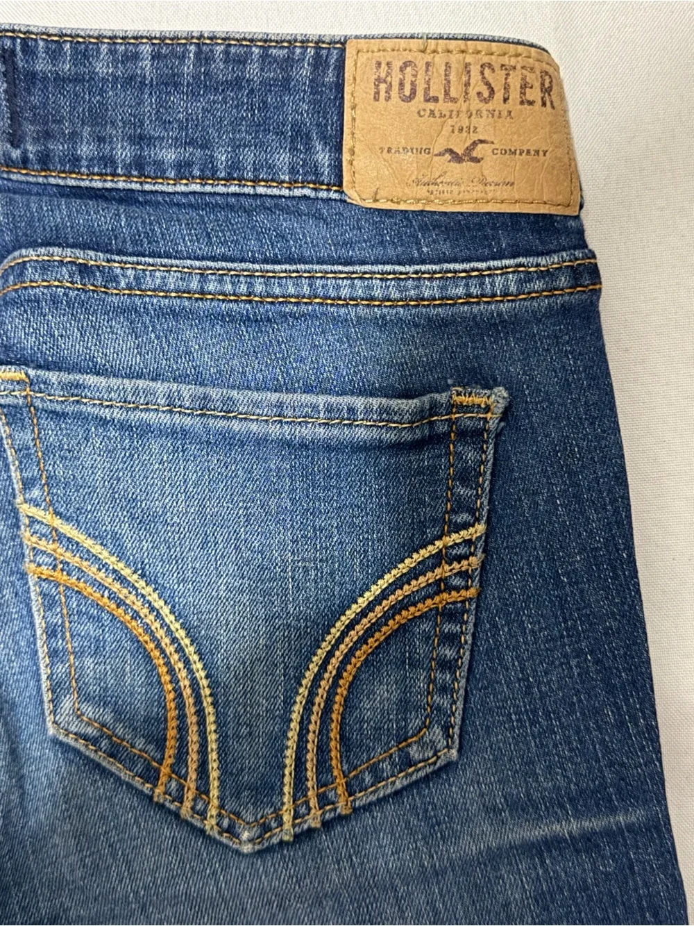 Hollister Men's Dark Blue Skinny Jeans with Faded Whisker Detail